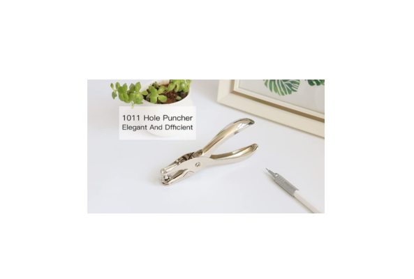 Meta Furniture single hole puncher in silver with ergonomic handles on white desk